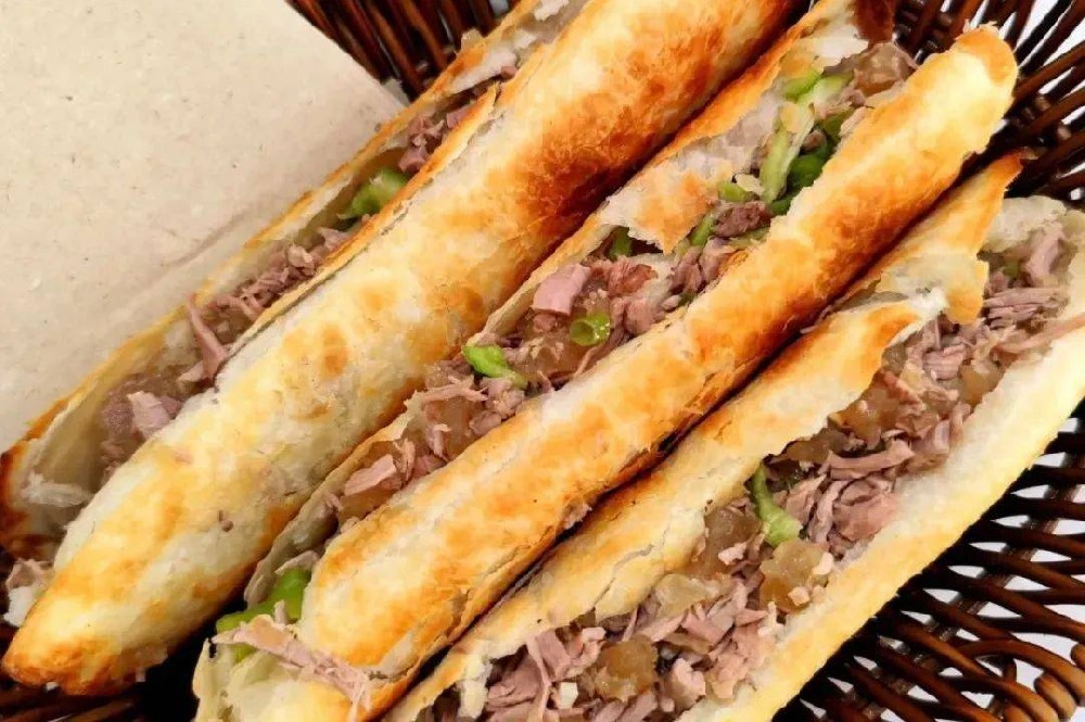 不想把“驢火”做成“燒餅夾肉”？關于“正宗河間驢肉火燒培訓”，看這就夠了